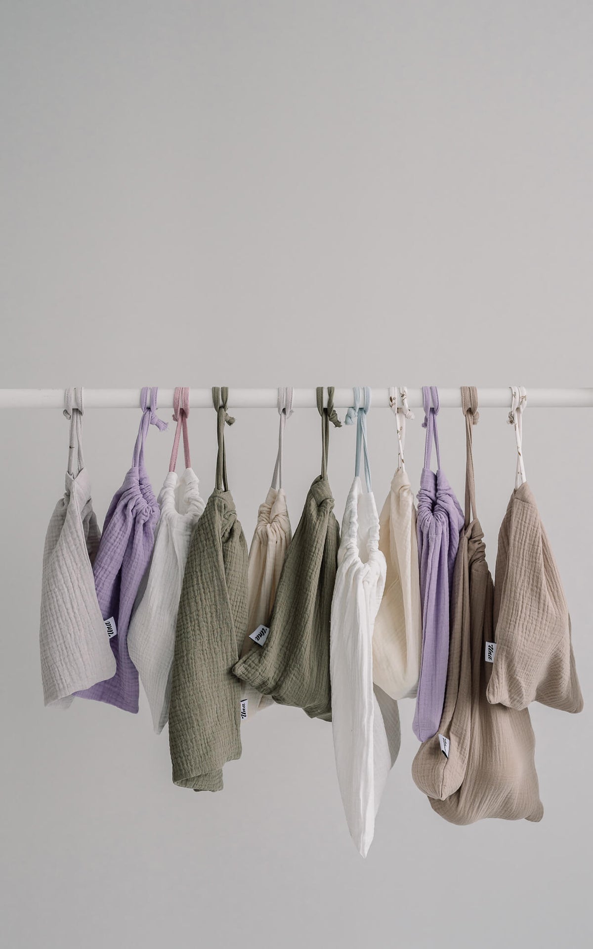 pussukka_grey_lightlavender_white_olive_lightbeige_darkbeige.jpg